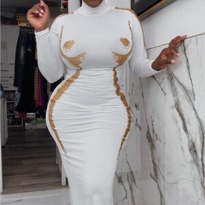 White maxi dress with gold silhouette glitter detailing. Show stopper!!!